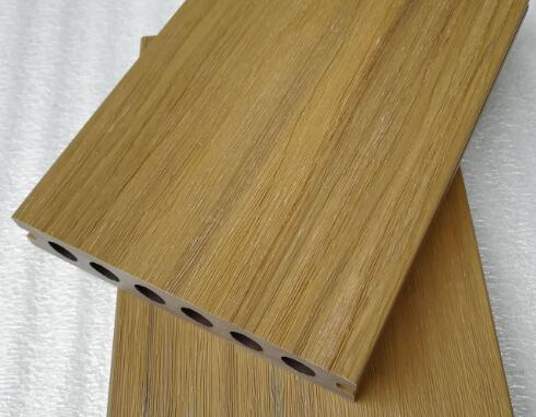 Capped co-extrusion decking board