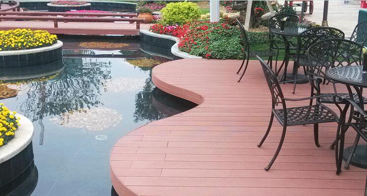 Composite outdoor decking board